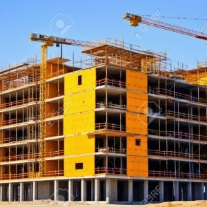 207766404-multi-storey-building-under-construction-with-scaffolding-new-residential-complex