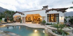 View of swimming pool and modern home exterior